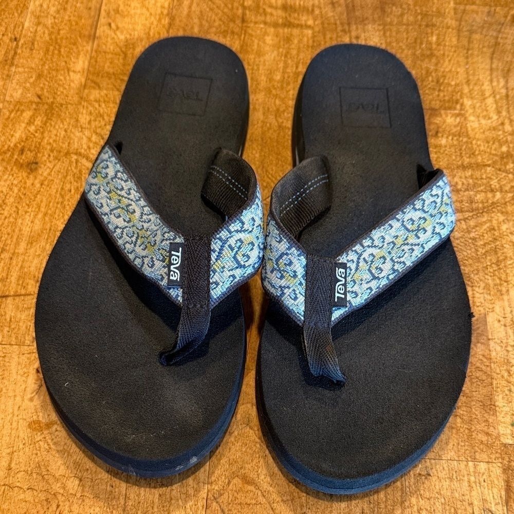 Teva Black Flip Flops with Blue and Yellow Patterned Straps
